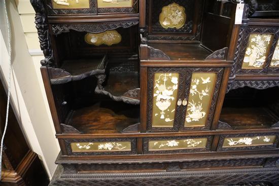 A Japanese Meiji period carved wood and shibayama cabinet, W.4ft 10in. D.1ft 4in. H.7ft 11in.